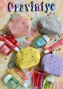 CARTERA DE PIÑA CON LIPGLOSS